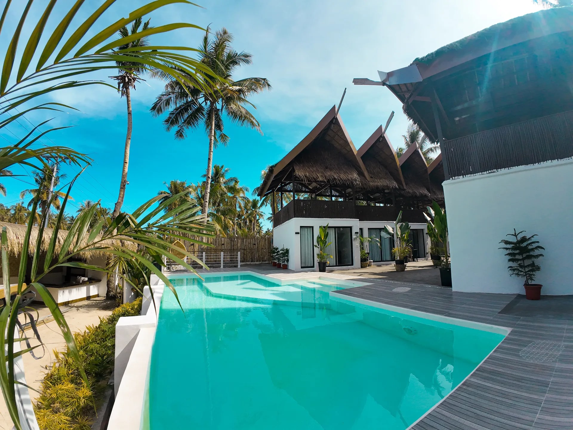 Cogon Tropical Resort pool and rooms
